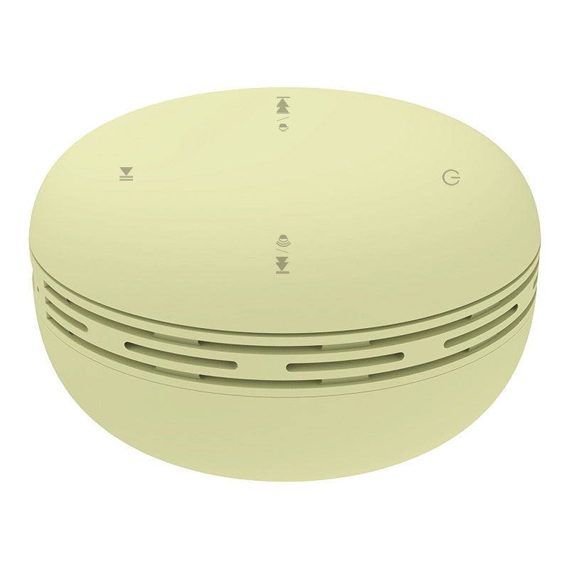 Mini Bluetooth speaker, pea green round design with vented side ring and top control icons