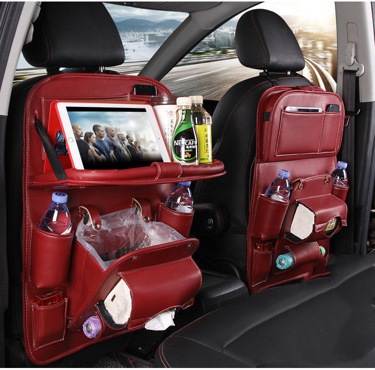 Red PU leather car seat back organizer with tray, bottle pockets, and multiple hanging compartments