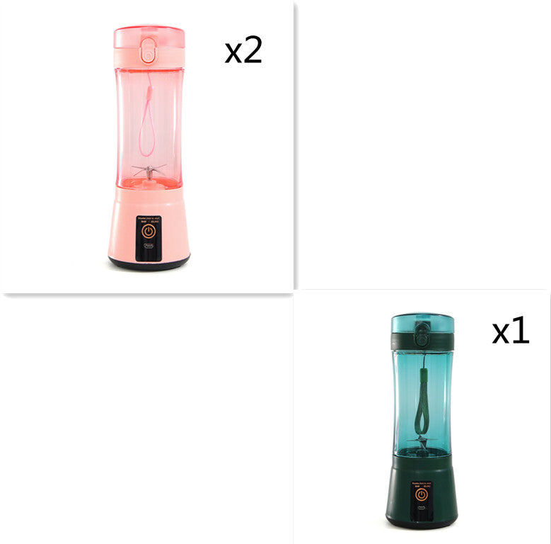 Portable electric fruit juicer blender with pink and dark green translucent cups, black base