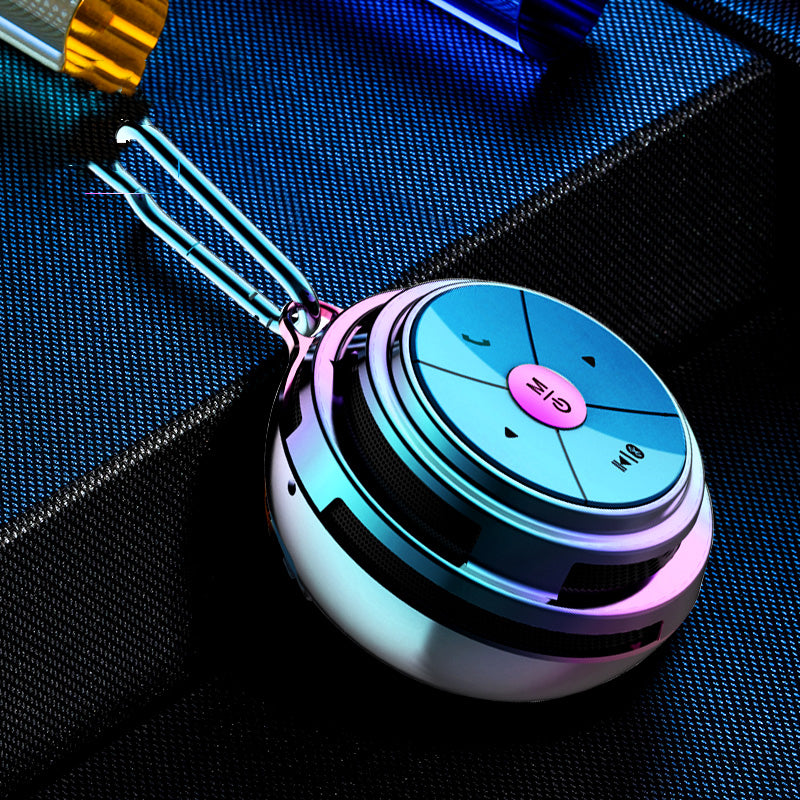 Portable Bluetooth speaker, light blue shell with purple LED ring and top controls