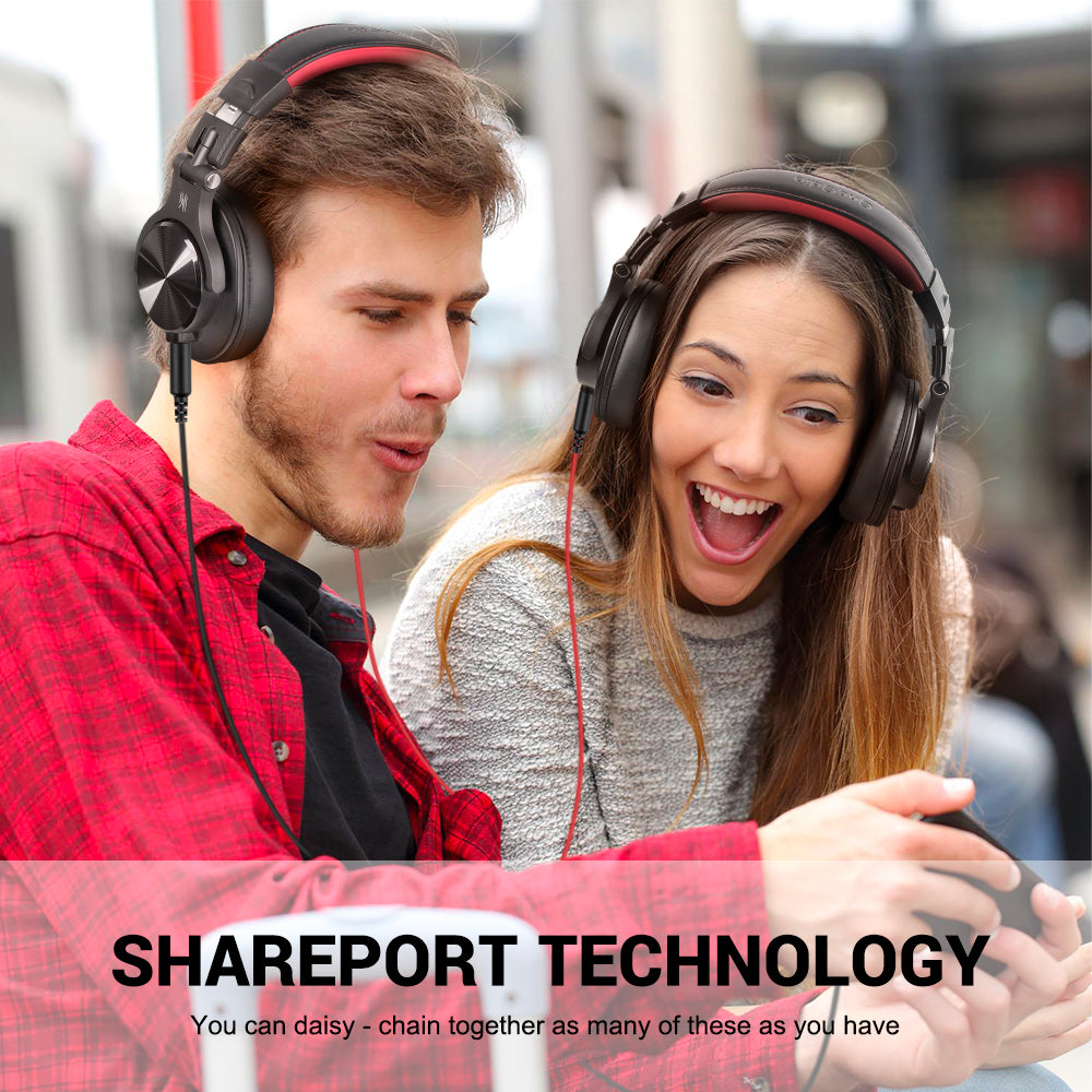 Black over-ear headphones with red headband accents worn by two people
