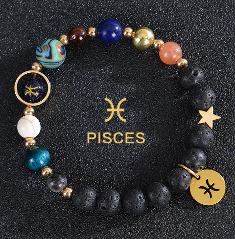 Zodiac bracelet with black lava beads and Pisces charm, star accent and disc.