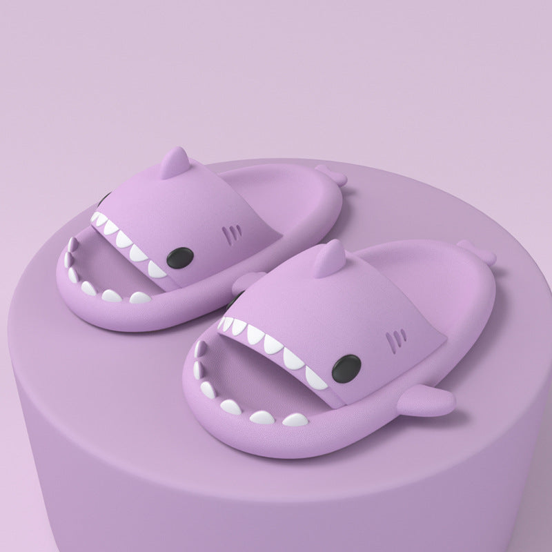 Cartoon shark slippers in purple, open-toe slip-on with white tooth trim and fins