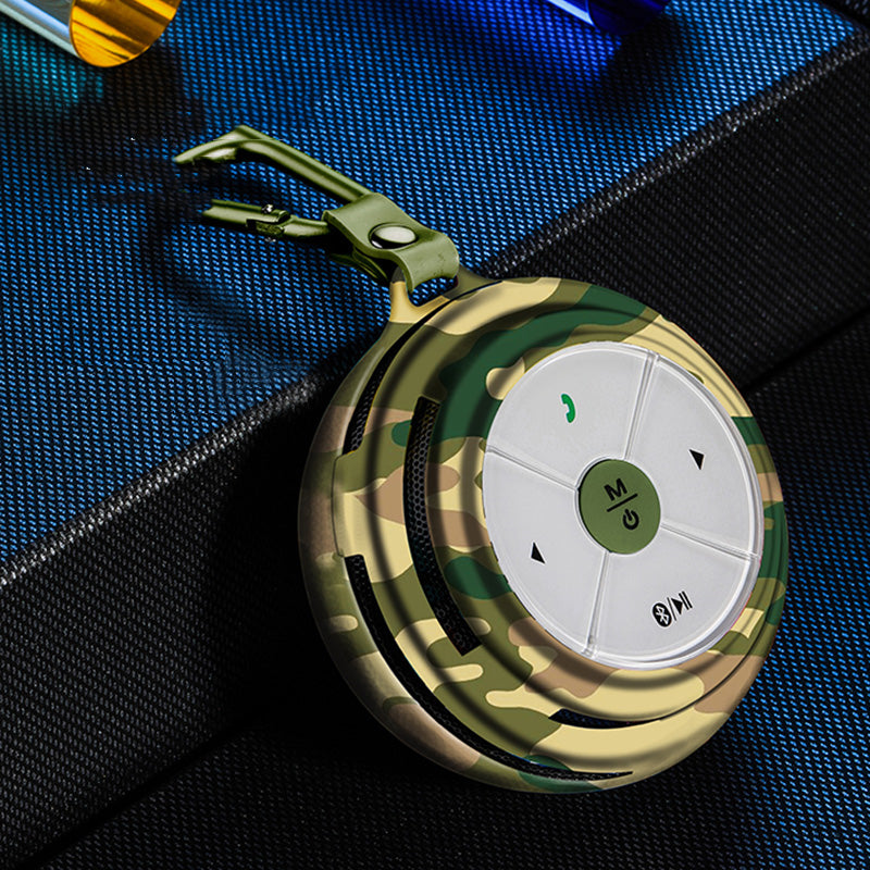 Portable Bluetooth speaker, camouflage shell with green control buttons and circular dial