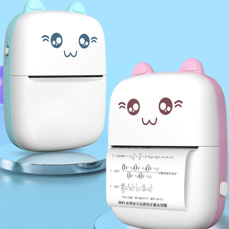 Mini label printer with cat face design, mint green body and white paper slot
