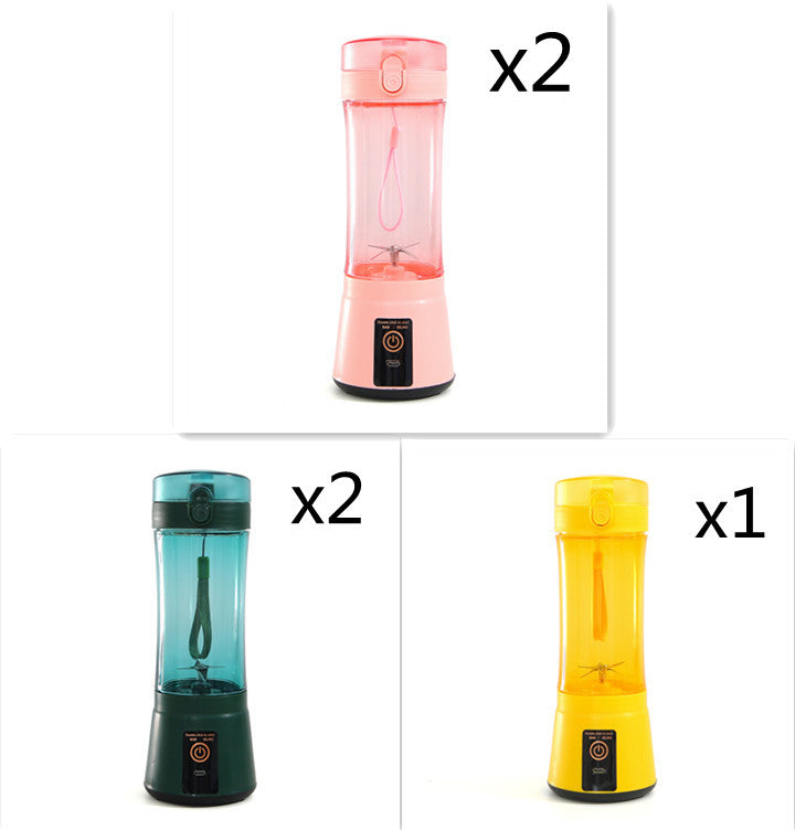 Portable electric fruit juicer set with pink, teal, and yellow blender cups