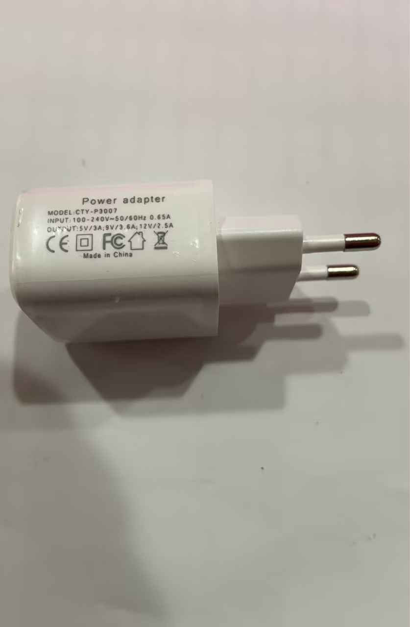 White power adapter with round-prong plug