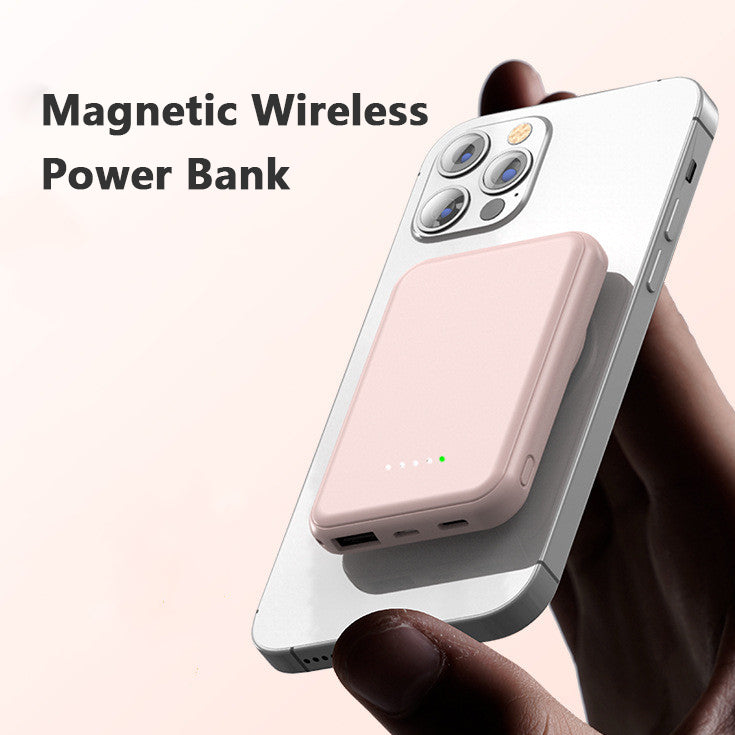 White magnetic wireless power bank with pink charging area and side ports