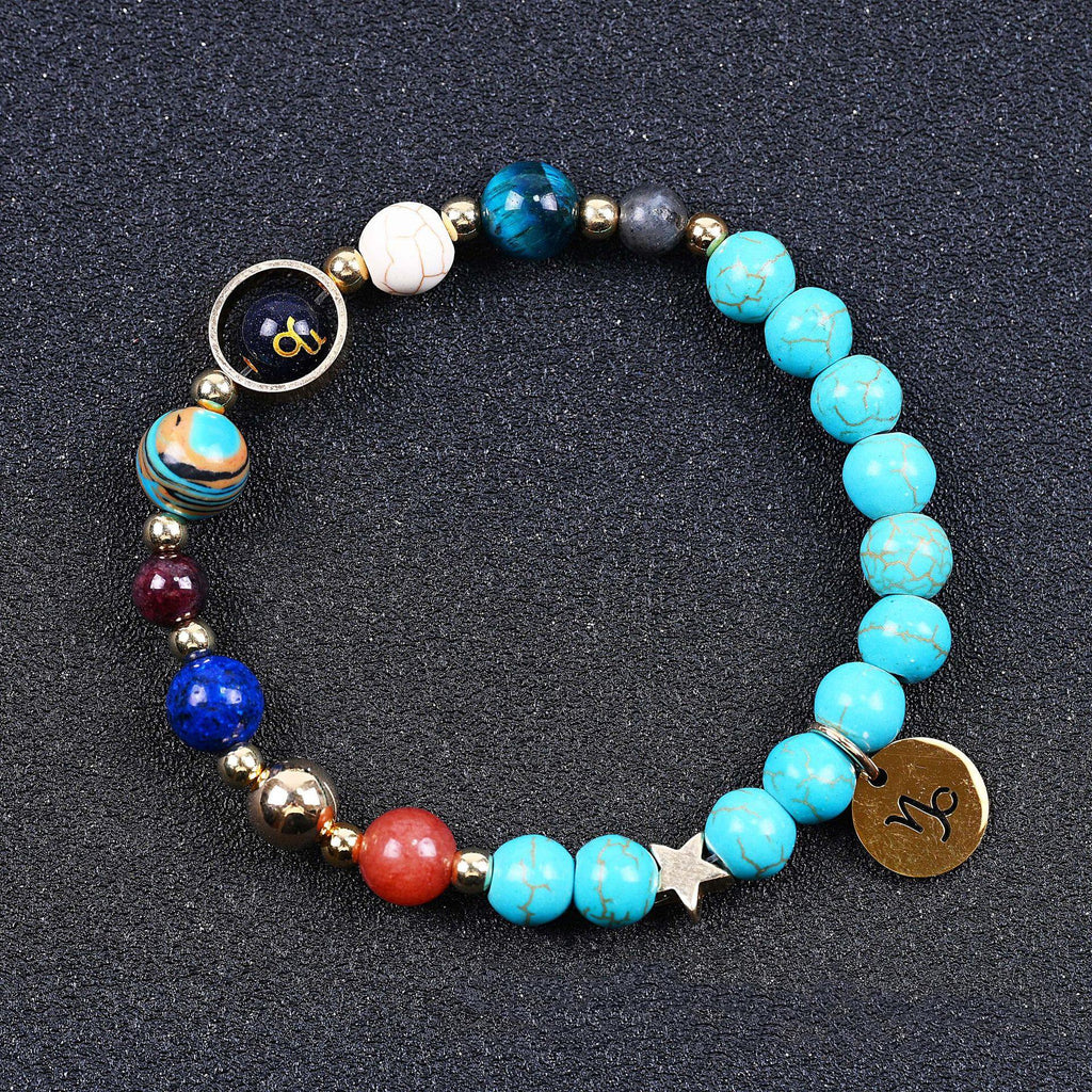 Turquoise beaded bracelet with mixed gemstone beads and round zodiac charm on end