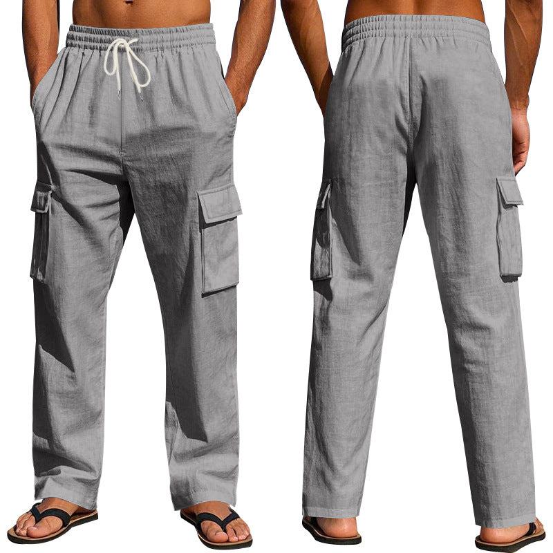 Dark gray linen cargo pants with elastic drawstring waist and flap side pockets